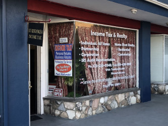 R T KINDOM,EA Income Tax & Realty